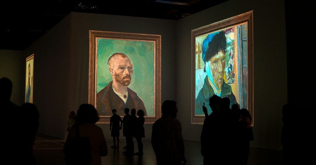 man in black suit standing near woman in black coat