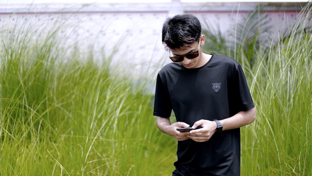 a man looking at his phone