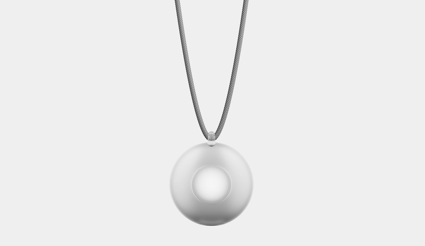 This looks like a glowing Apple AirTag on a chain