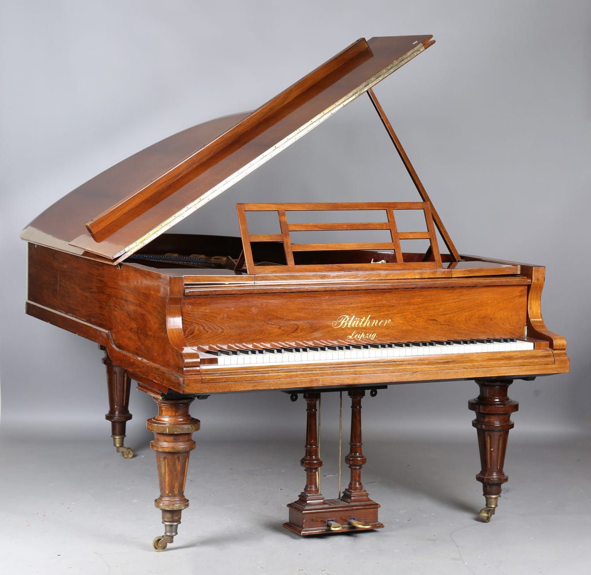An early 20th century rosewood cased boudoir grand piano by Bluthner, circa  1909, serial number '808