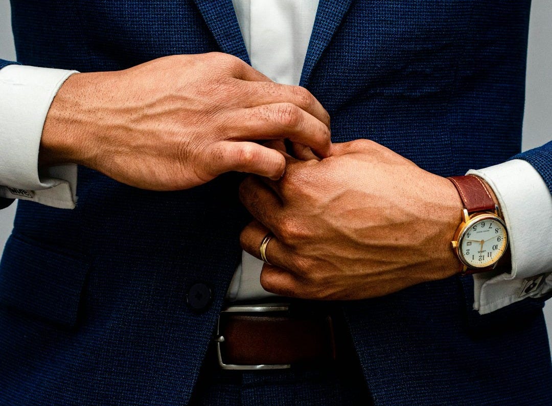 man in blue suit jacket and white dress shirt man in blue suit jacket and white dress shirt