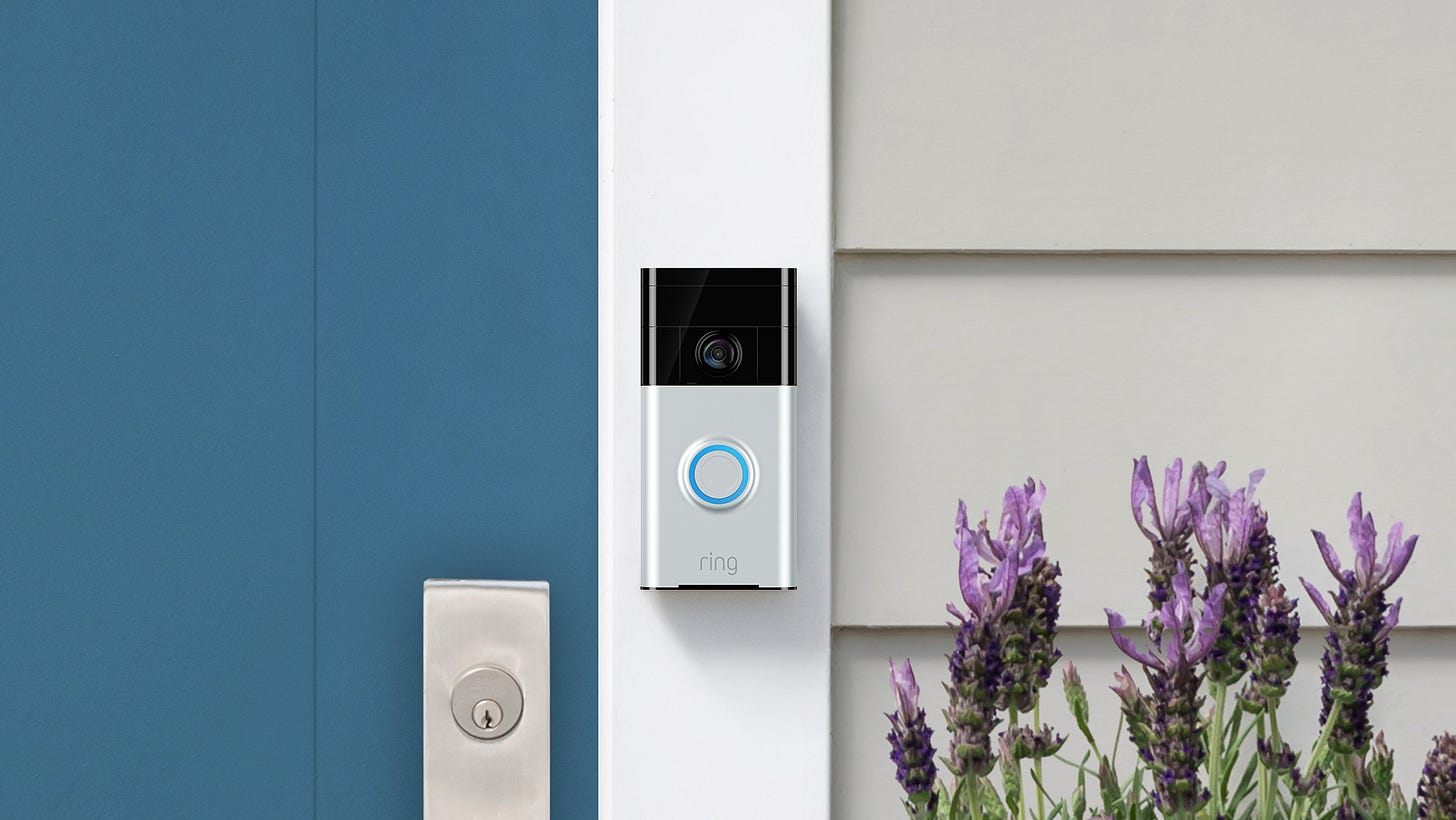 A photo of Ring doorbell on a door frame outside of a home. A photo of Ring doorbell on a door frame outside of a home.