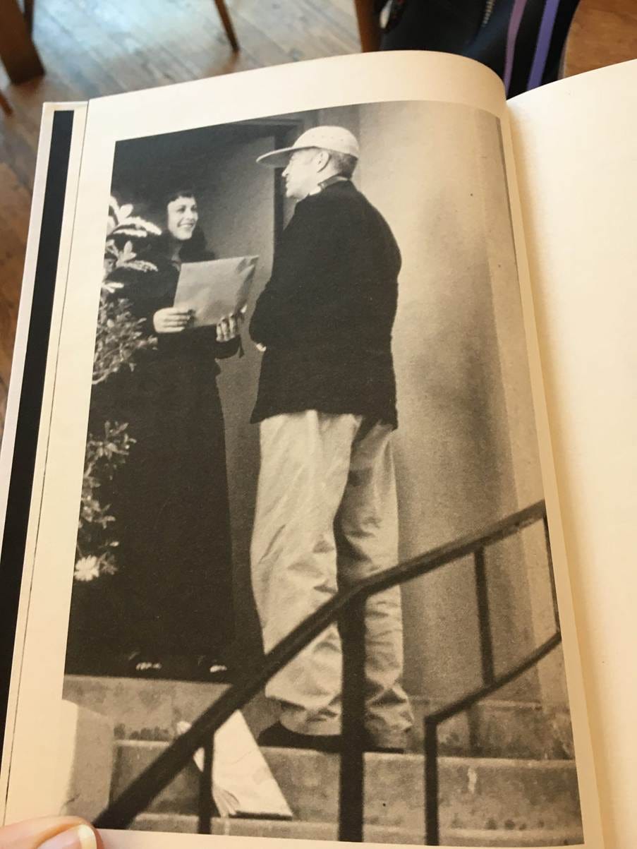A black and white photo of a person standing on a staircase

AI-generated content may be incorrect.