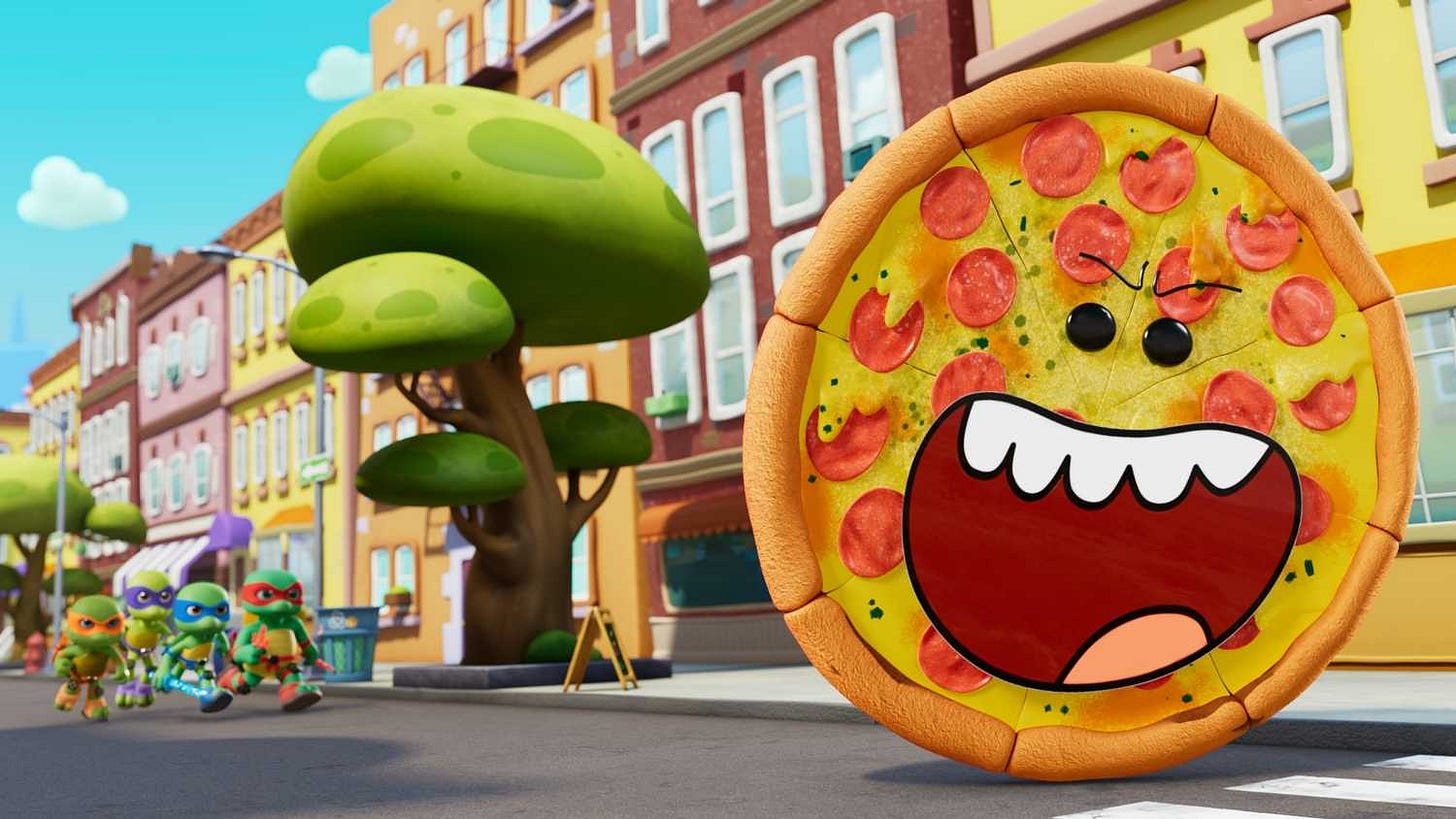 Teeny Mutant Ninja Turtles chase a giant pizza Teeny Mutant Ninja Turtles chase a giant pizza