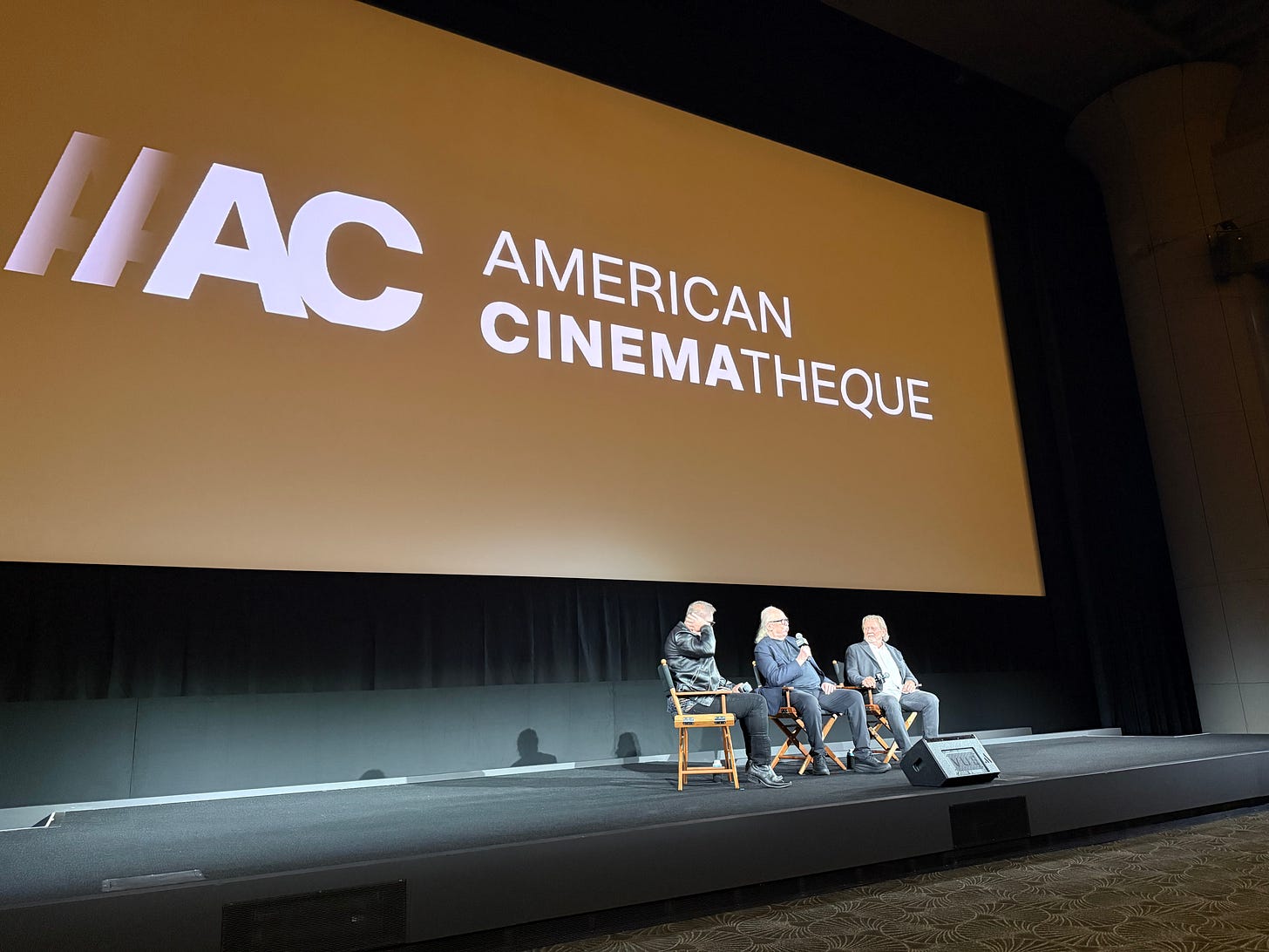 The American Cinematheque stage at the Egyptian Theater, featuring John Carpenter, middle