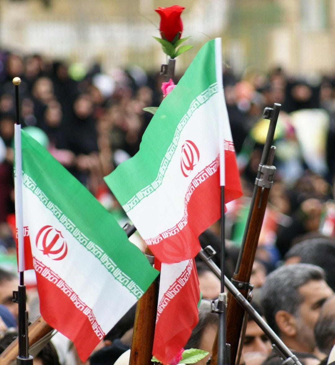 people holding flags during daytime people holding flags during daytime