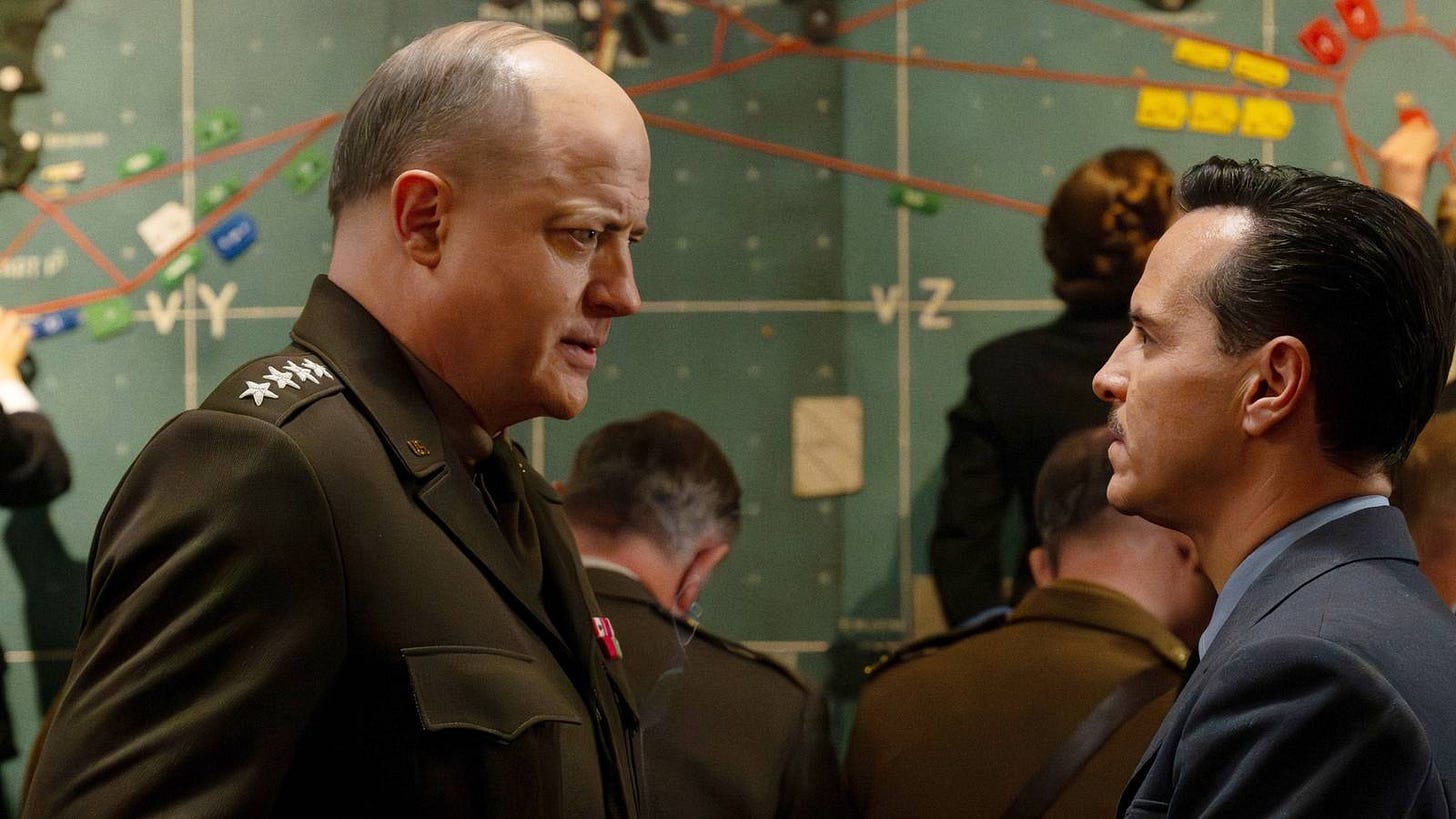 Brendan Fraser as Dwight Eisenhower and Andrew Scott as James Stagg facing each other in Pressure Brendan Fraser as Dwight Eisenhower and Andrew Scott as James Stagg facing each other in Pressure