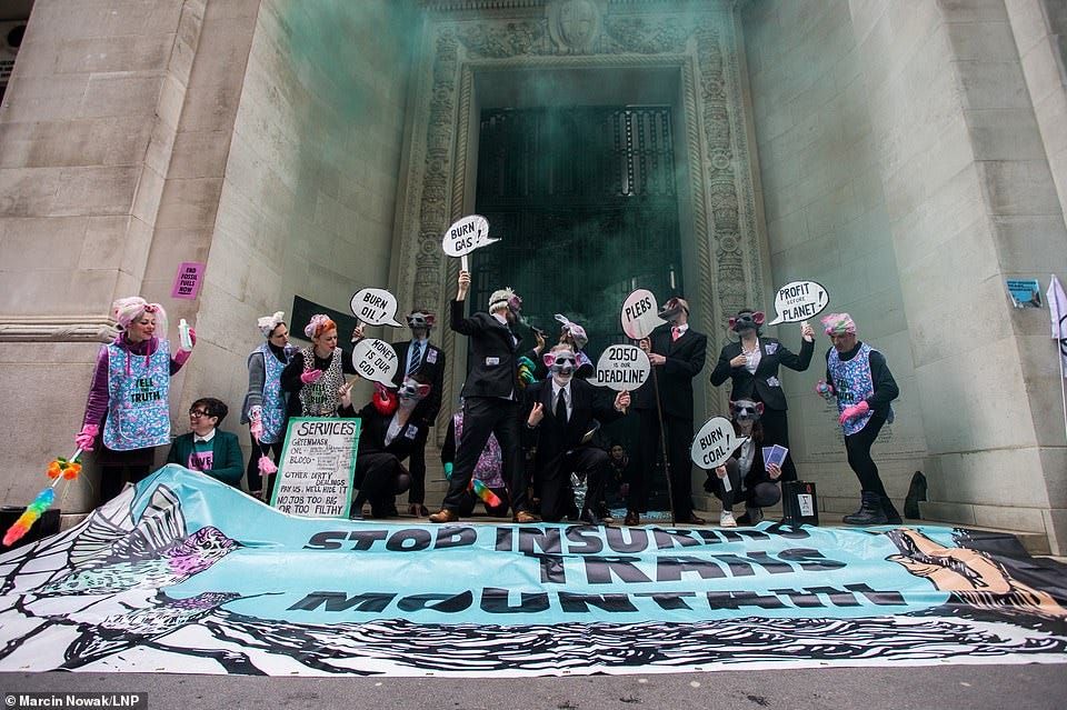 Some protesters have dressed up as rats and 'dirty scrubbers' for the protest as they aim jabs at the nearly 340-year-old firm this morning