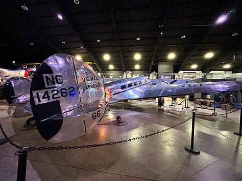 displays, exhibits, signs, planes