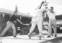Examples of caning, demonstrated on dummies