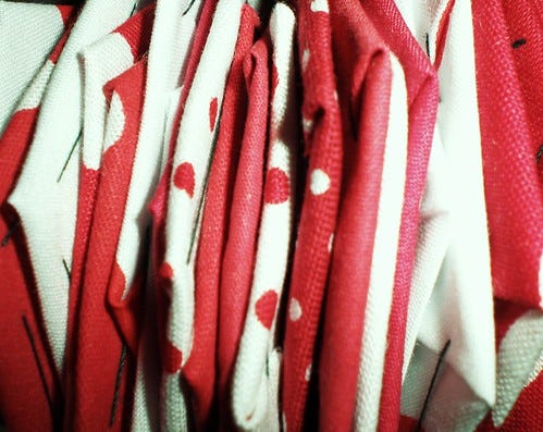 red patchwork hexagons side on red patchwork hexagons side on