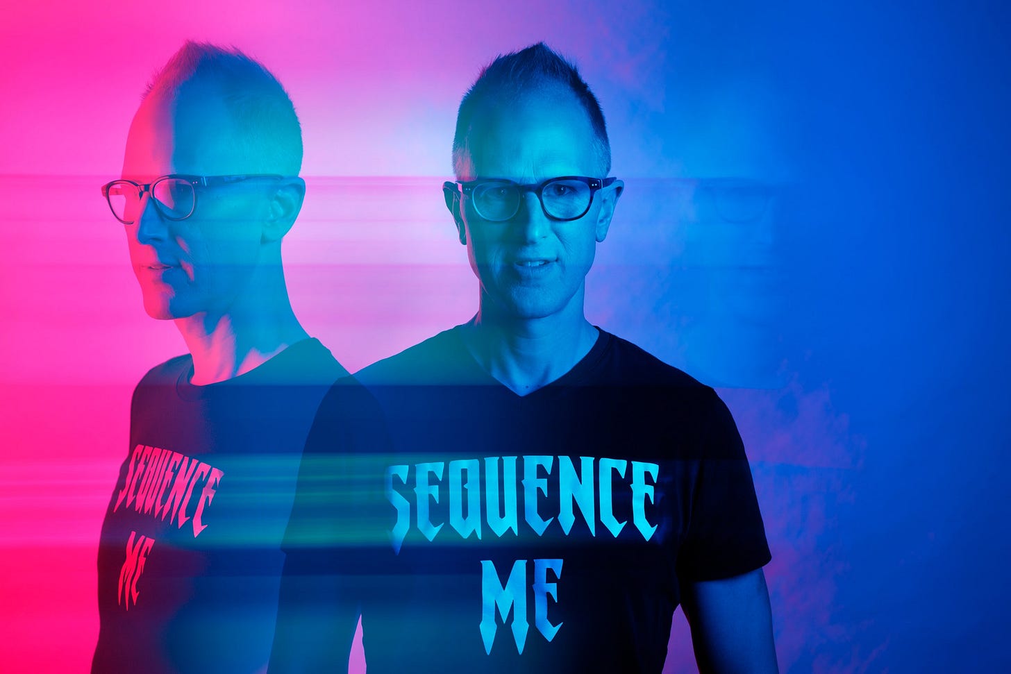 Bryce Olson wearing a Tshirt with the words SEQUENCE ME. 