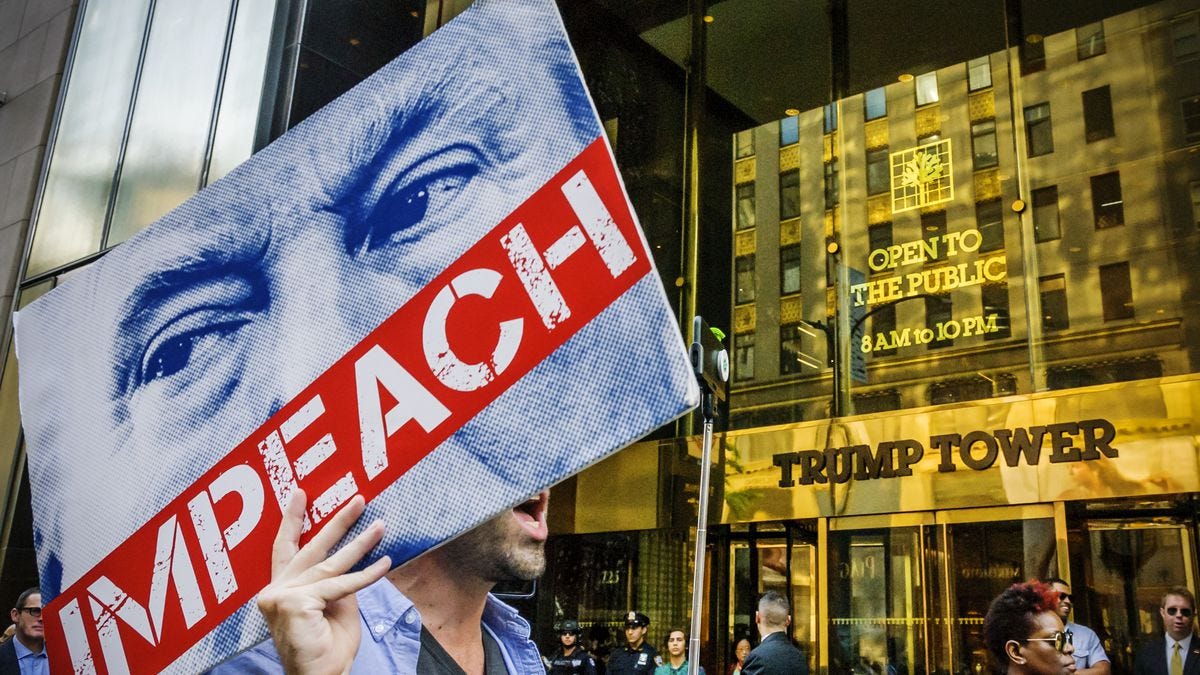 Protesters demanding the impeachment of Donald Trump. Protesters demanding the impeachment of Donald Trump.