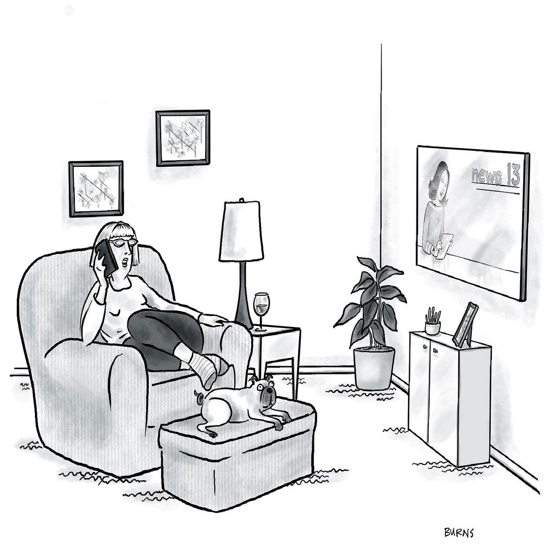 A woman lounges on an easy chair talking on the phone. A woman lounges on an easy chair talking on the phone.