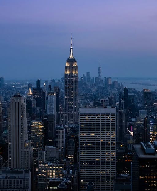 May be an image of twilight and skyscraper