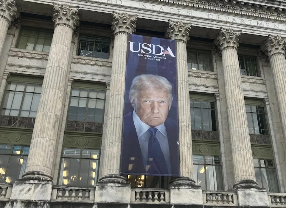 Deeply creepy': Enormous brooding banner of Trump now hangs next to Lincoln  outside Department of Agriculture