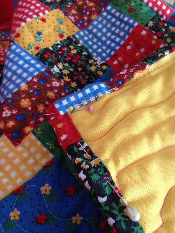 Adding binding to a community quilt Adding binding to a community quilt