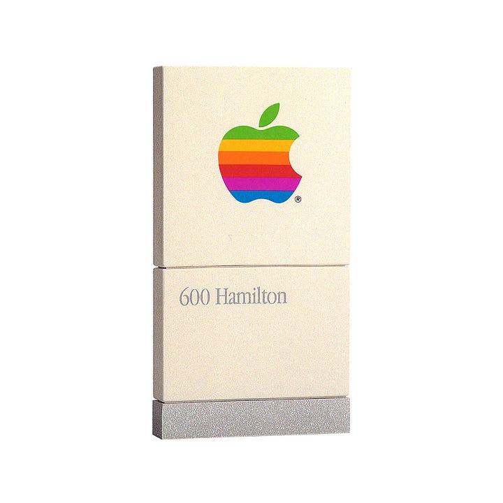 Apple, 1987 logo Rob Janoff, Japanese business card, bag, signage and van livery, LogoArchive Logo Histories