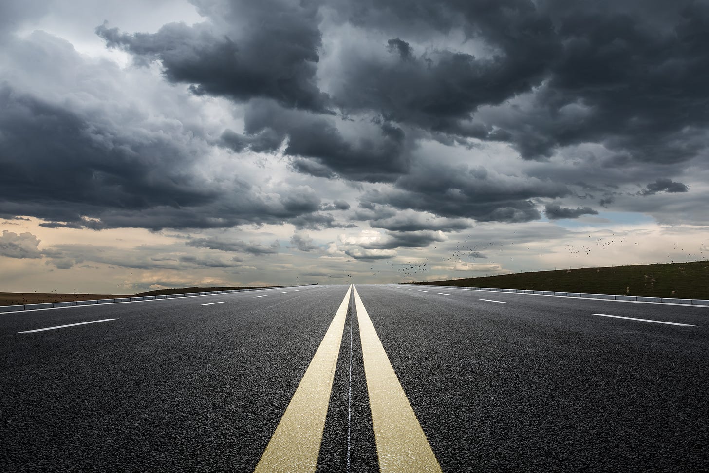 stormy skies over a highway