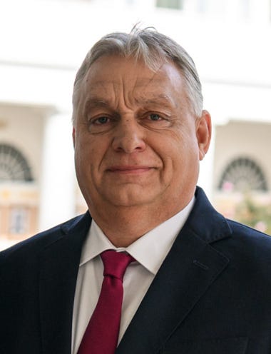 Viktor Orban head and shoulder shot; dark suit, red tie, gray hair, older white man with big head and furrowed brow