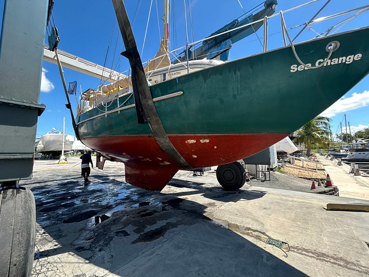 Pacific Seacraft sailboat on lift and stands. Pacific Seacraft interior organization.