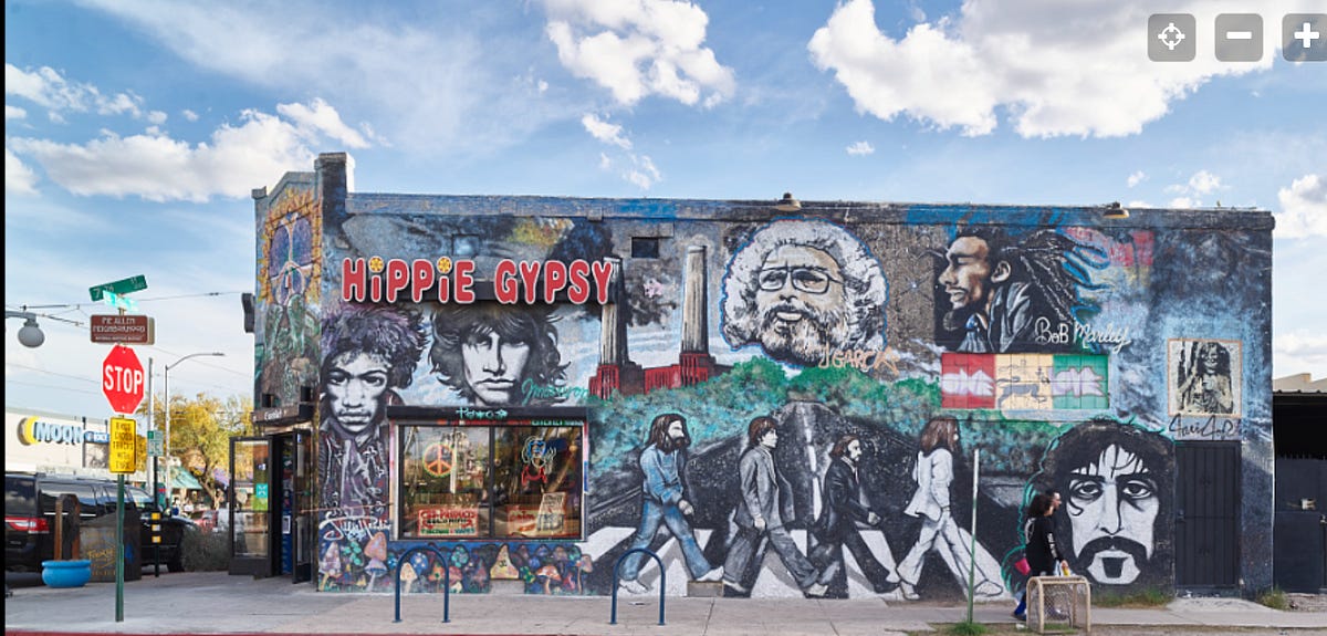 hand drawn and painted hippie mural on the side of a building — Bob Marley, Beatles Hippie Gypsy, peace signs (My formative years)