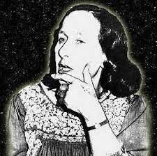 A person with her hand on her chin

Description automatically generated