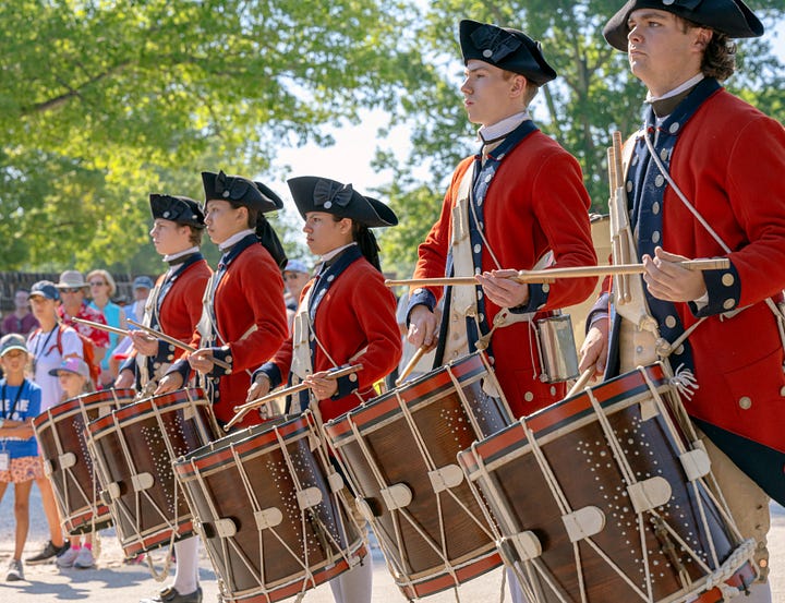 pictures of fireworks over Yorktown waterfront and CW fife and drum corps marching