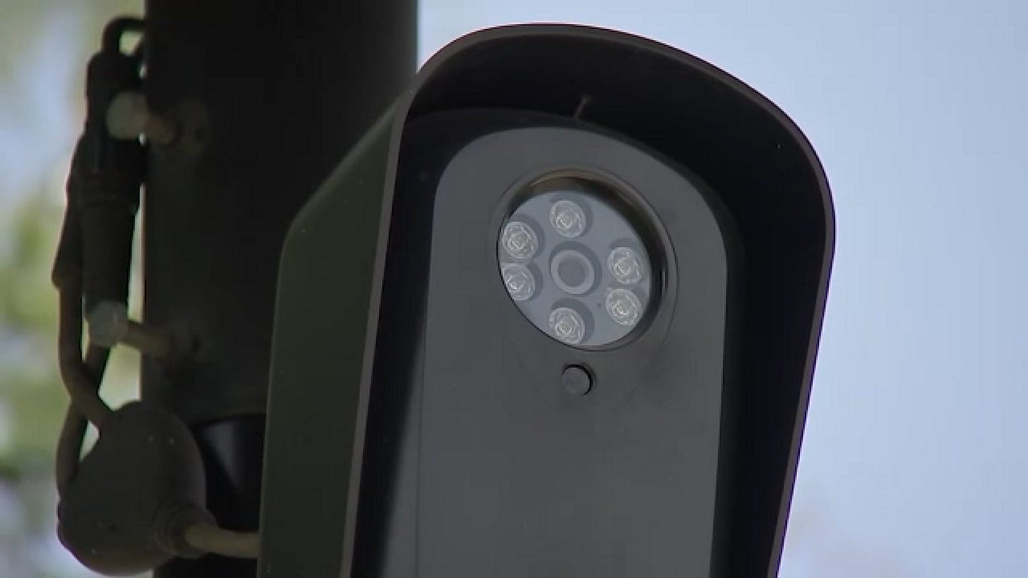 Closeup of Flock camera on a pole.