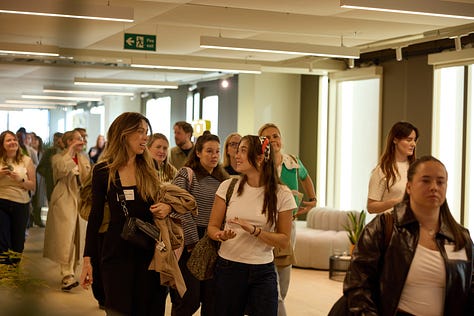 Photos of people walking into one of our hero events, someone smiling at a recent supper club, and people listening in a workshop.