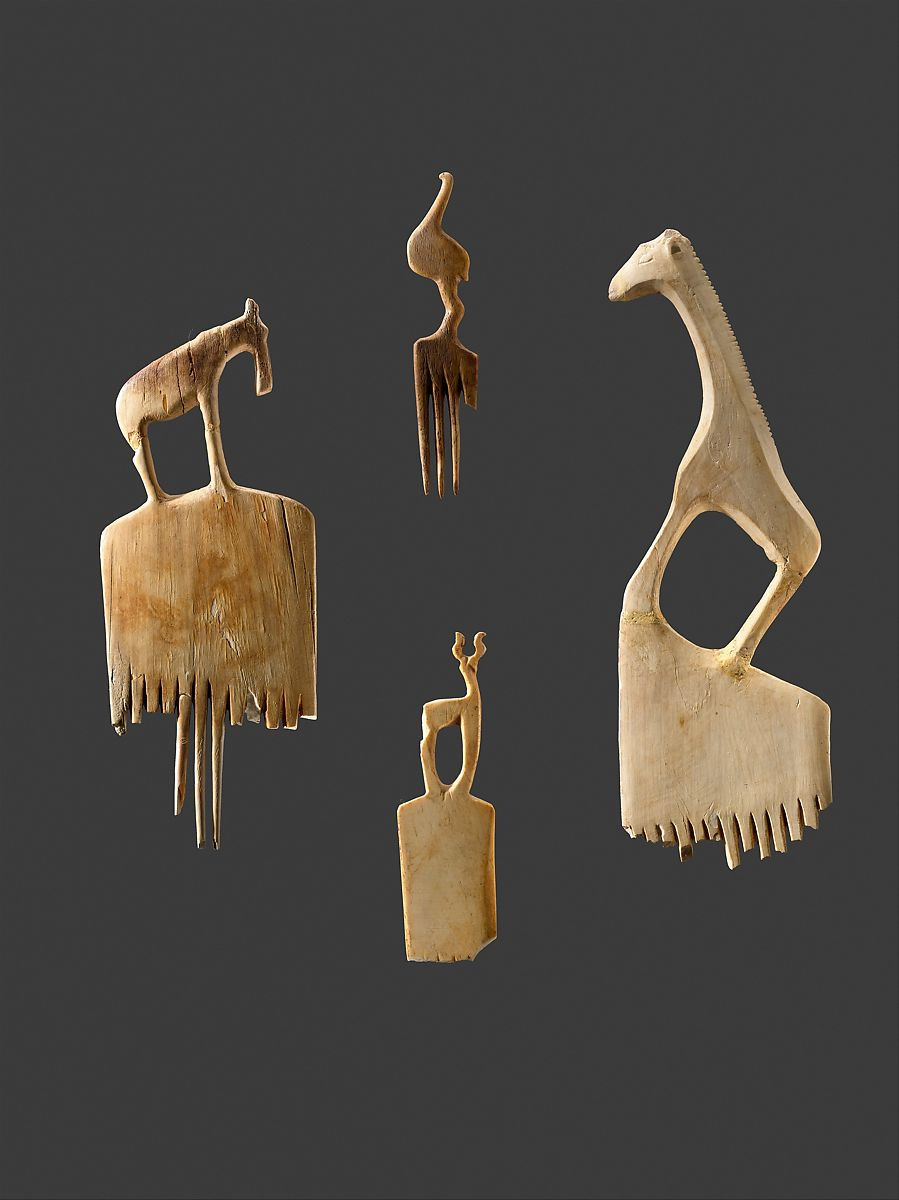 Comb with a giraffe, Ivory (elephant) 