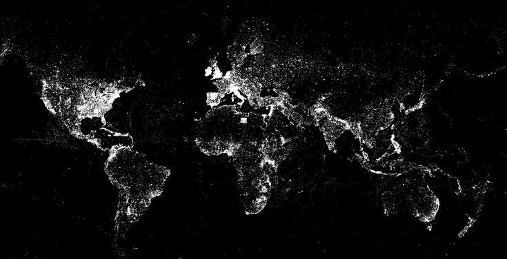 This may contain: black and white map of the world with dark spots on it's sides, showing areas where there is only one light source