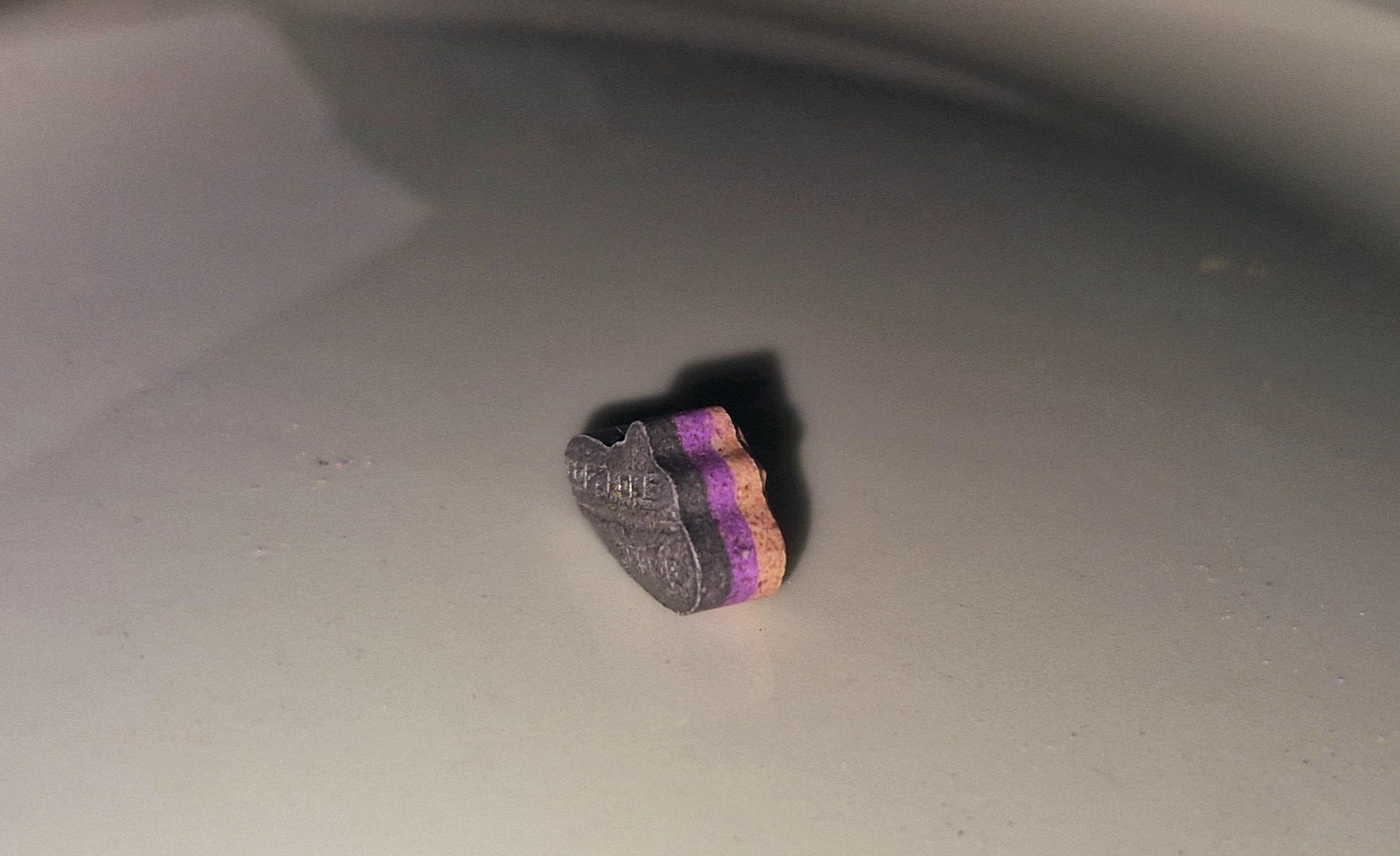r/drugsarebeautiful - A 3 layered pop smoke extasy pill.