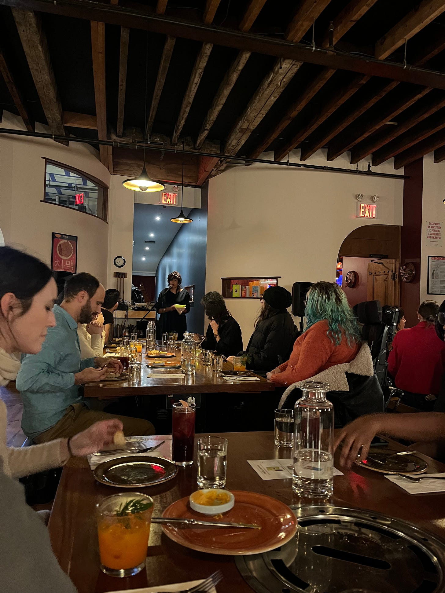 people listening to an author read