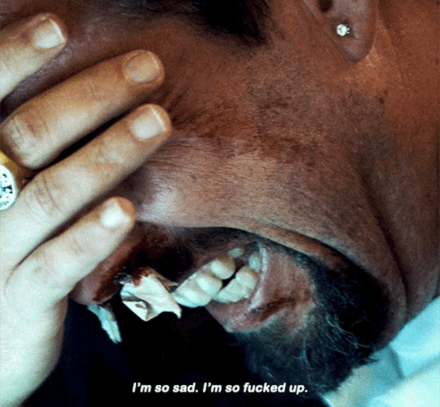a close up of a man covering his face with his hand and the words i 'm so sad i 'm so fucked up a close up of a man covering his face with his hand and the words i 'm so sad i 'm so fucked up