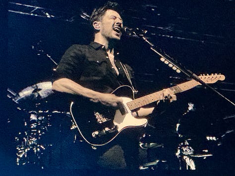 Various photographs from the Mumford and Sons concert