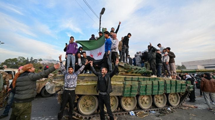 Opposition fighters declare Syria’s Damascus ‘liberated’, al-Assad ousted