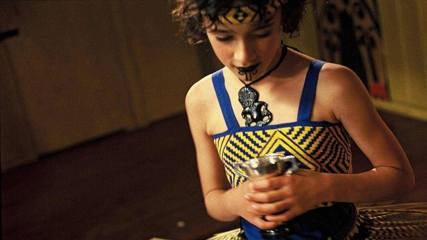 Whale Rider | Still features Keisha Castle-Hughes as Pai preparing for a performance.