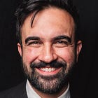 Mamdani's smile is actually a very scary mask.