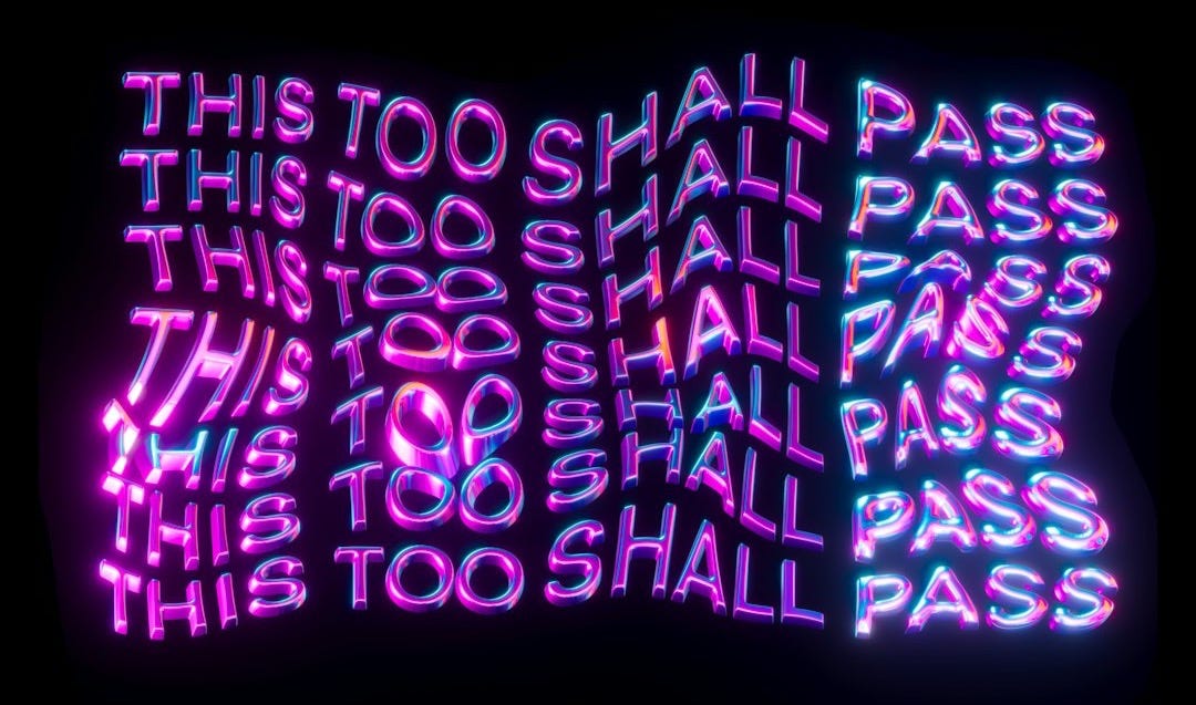 a neon sign that reads this too shall pass