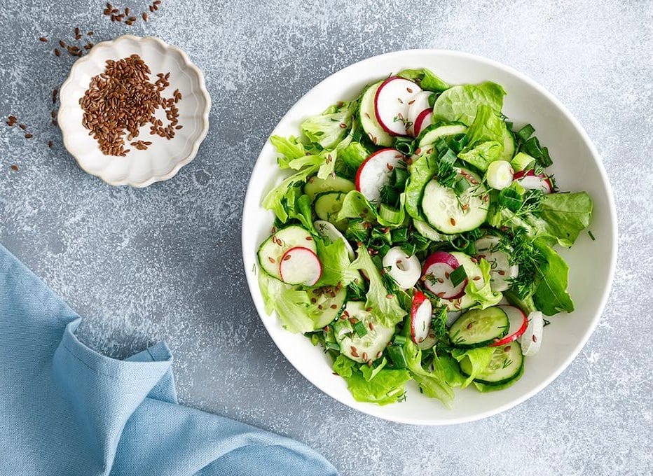 Salad With Fresh Green Lettuce, Radish And Cucumber