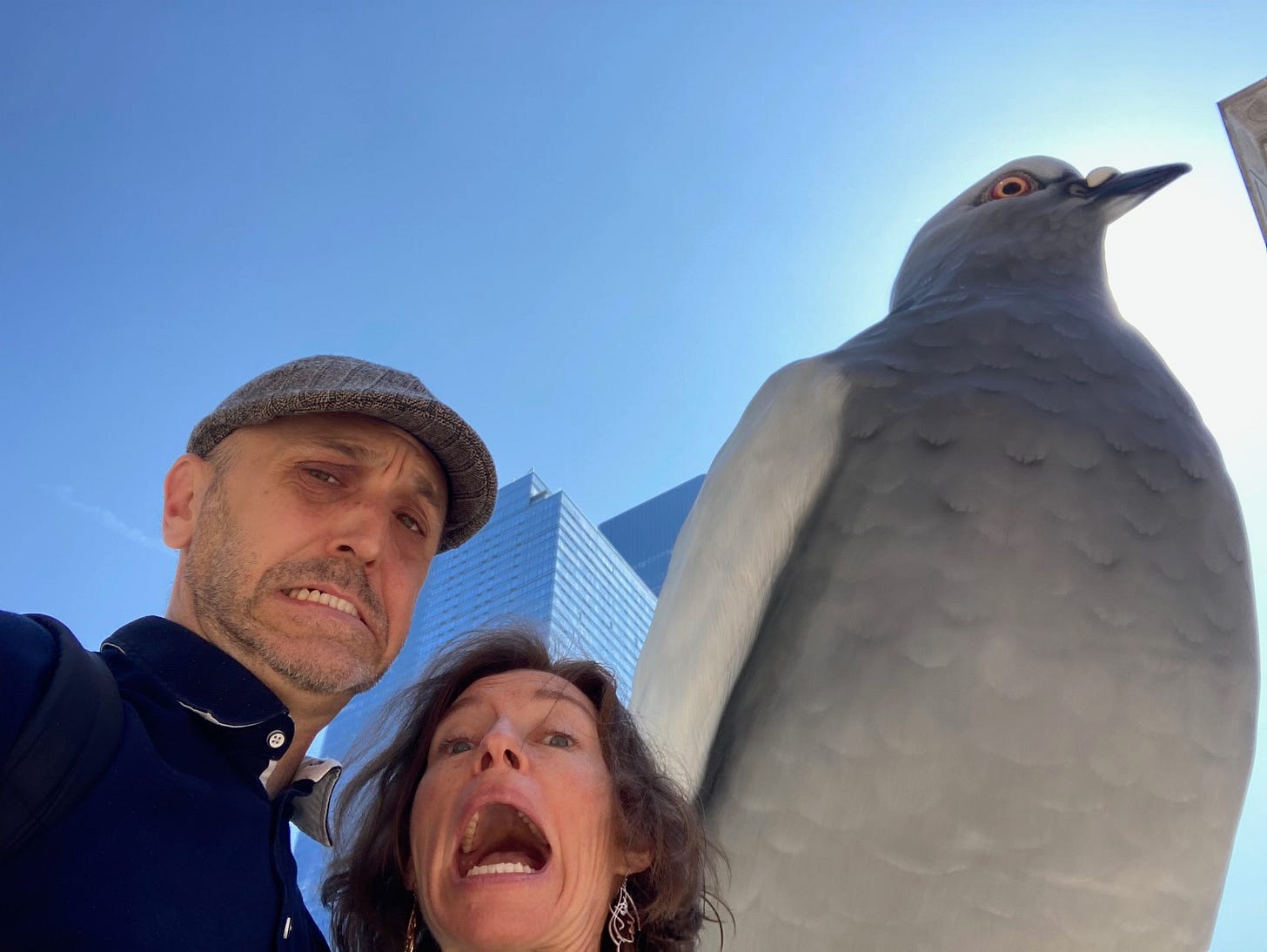 Christina and Paul being scared of a giant pigeon sculpture