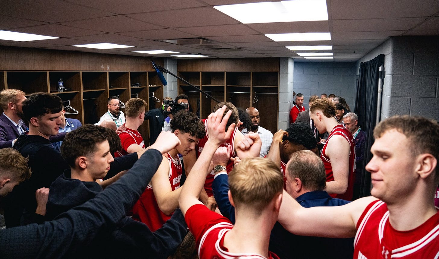Wisconsin Badgers basketball players in the locker room following a Big Ten Tournament game. Wisconsin Badgers basketball players in the locker room following a Big Ten Tournament game.