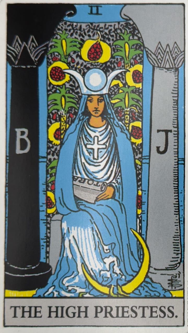The High Priestess tarot card and the Star Brothers oracle card.