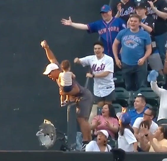 MLB Fan Makes Terrifying Over-The-Railing Catch With Baby In Hand MLB Fan Makes Terrifying Over-The-Railing Catch With Baby In Hand