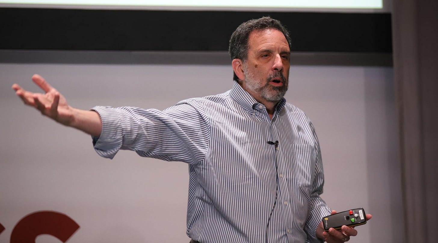 Rich gesturing while carrying slide remote Rich gesturing while carrying slide remote