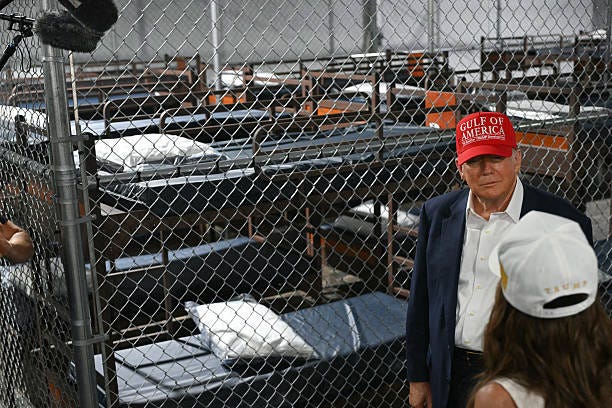 President President Donald Trump speak with Secretary of Homeland Security Kristi Noem as they tour a migrant detention center, dubbed "Alligator...