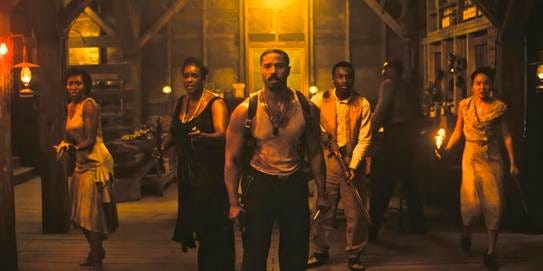 A group of people standing in a hallway

AI-generated content may be incorrect.