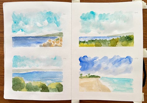 Watercolour landscapes in a sketchbook