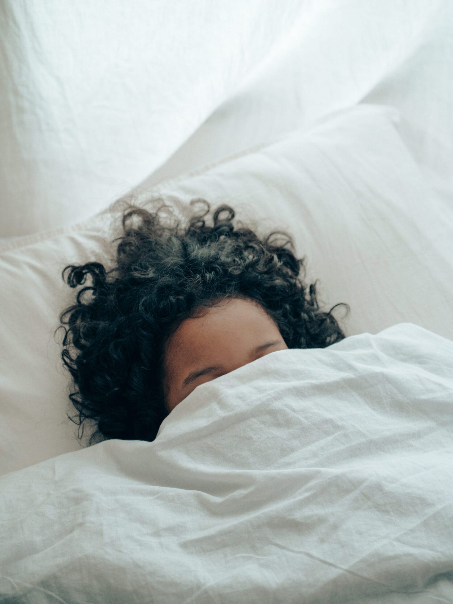 Hitting The Wall, girl sleeping under white covers